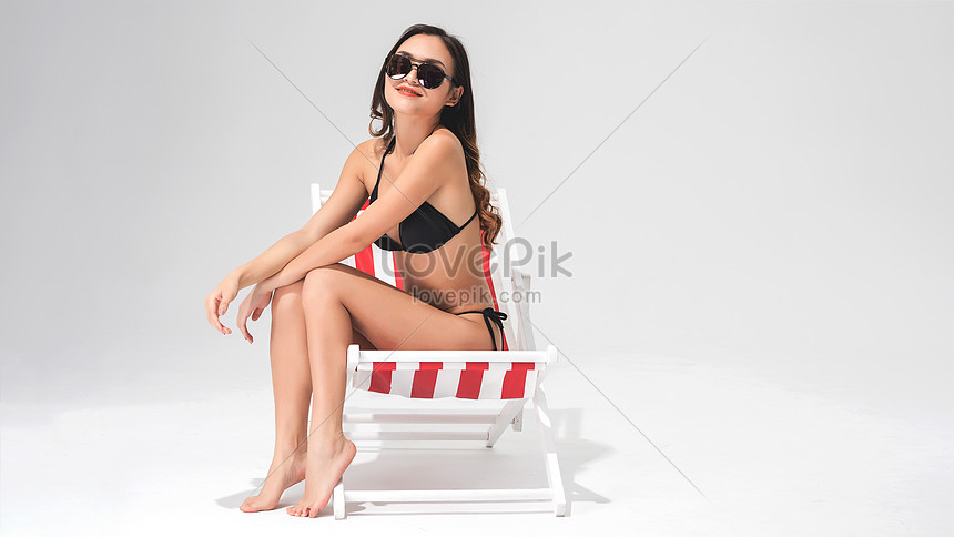 Black Bikini Beauty Sits On The Beach Chair Picture And Hd Photos