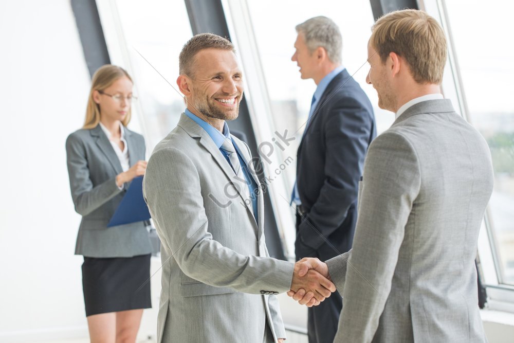 Businesspeople Exchanging Handshakes Picture And Hd Photos Free