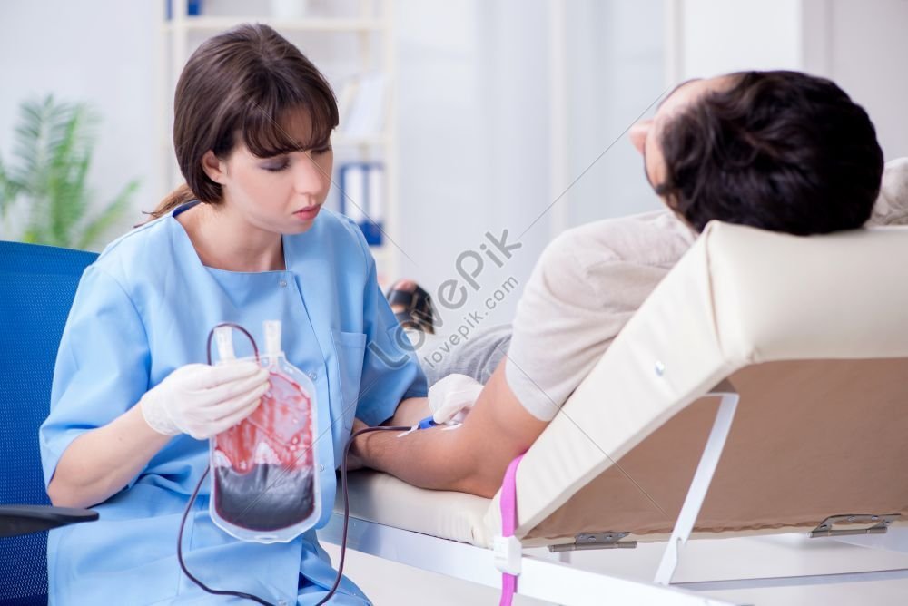 Patient Receiving Blood Transfusion In Hospital Clinic Photo Picture