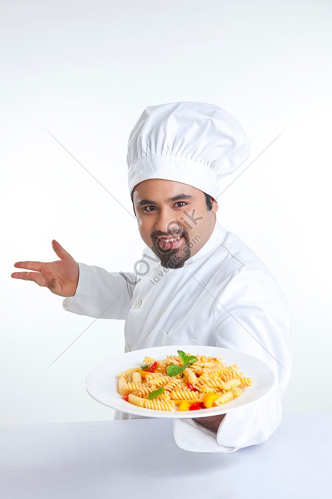 Portrait Of Chef Holding Plate Of Pasta Picture And HD Photos Free