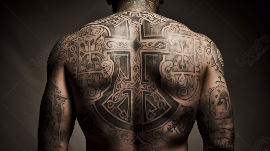 Upper back christian cross tattoo.
