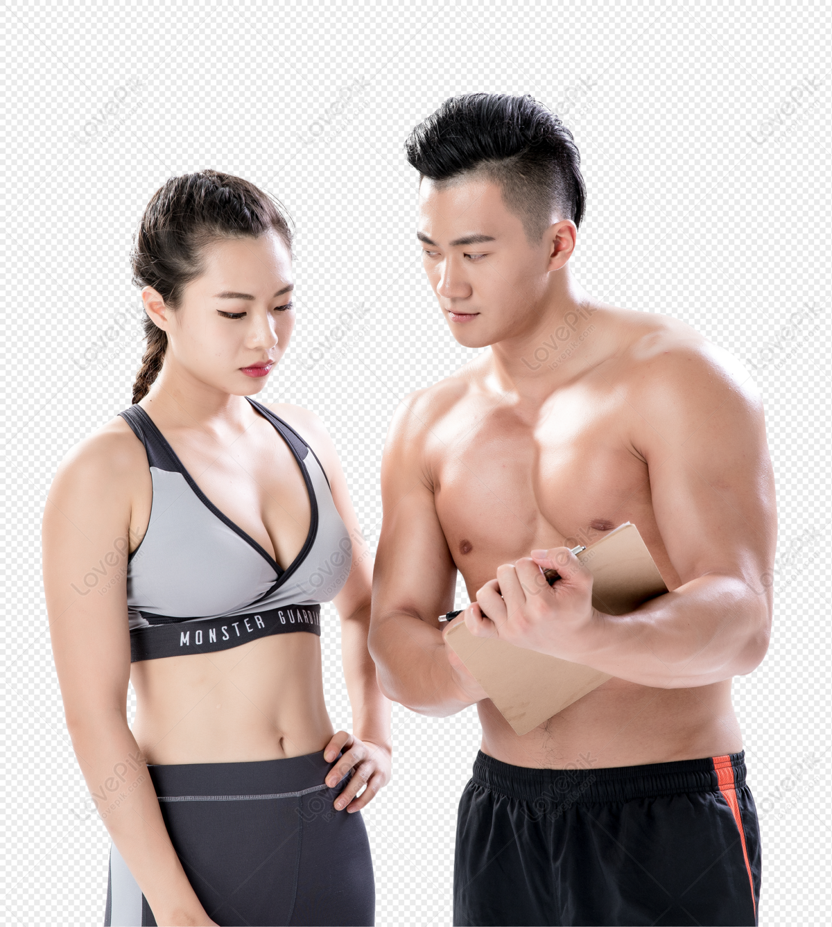 Fitness Instructor Guiding Young Woman When She Exercises