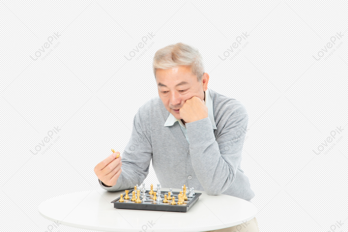 Download A Person Is Playing Chess On A Board Wallpaper