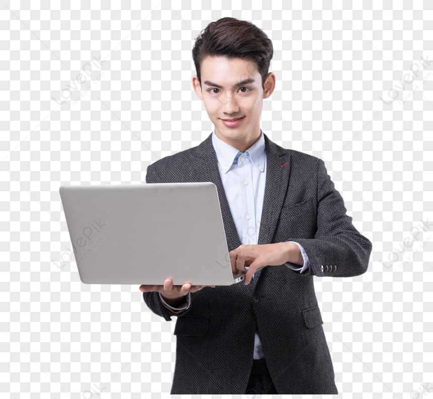 Homem de terno, trabalhando com o laptop, segurando nas mãos o