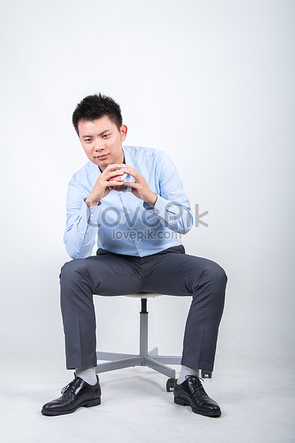 A Business Man Sitting In A Shirt Picture And Hd Photos 