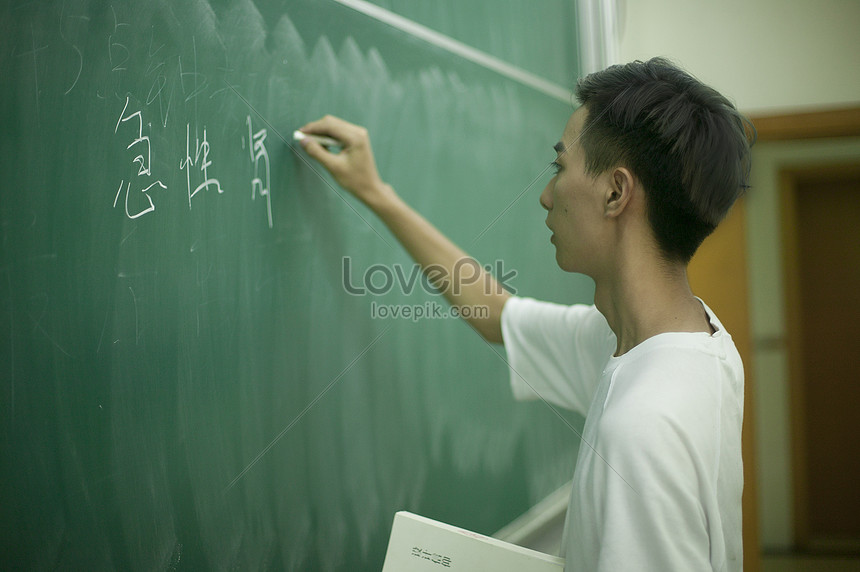 The Students Write In Front Of The Blackboard In The School Clas ...