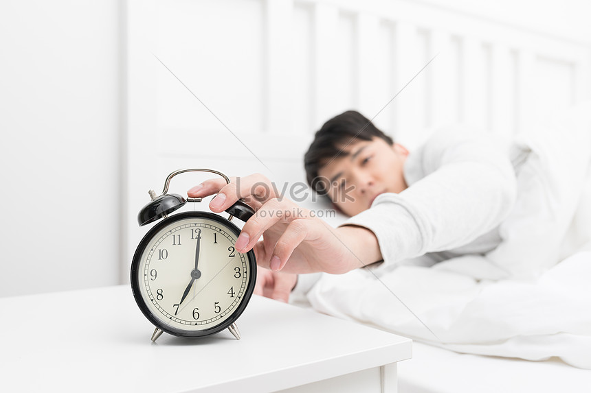 Young People Awakened By The Alarm Clock In The Morning Picture And HD ...