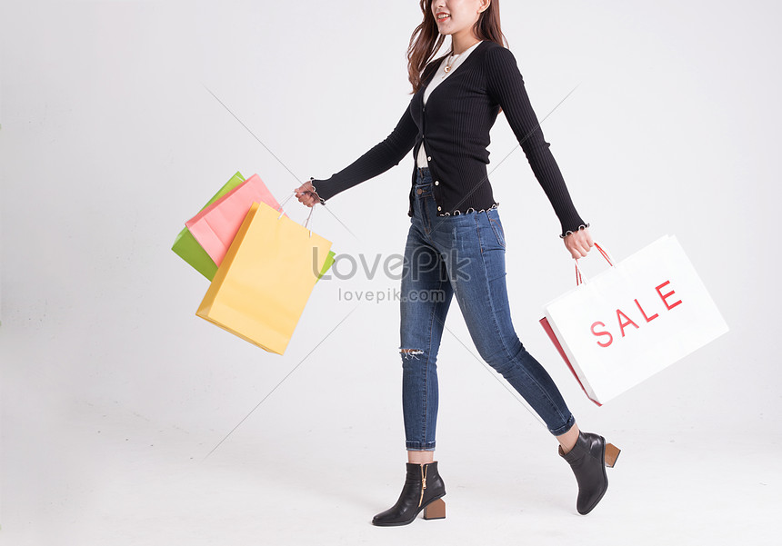 Young Women Walk With Shopping Bags Picture And HD Photos | Free ...