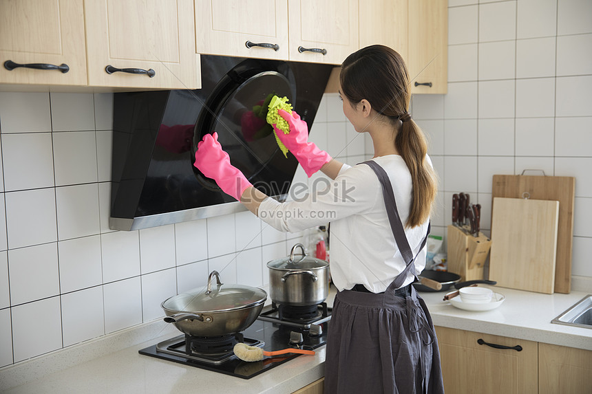 Mother Cleaning The Kitchen In The New Home Picture And HD Photos ...