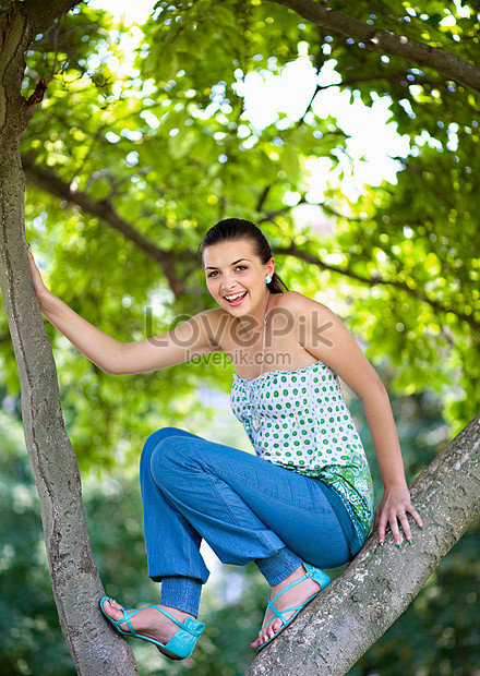 Young Woman Climbing Tree Picture And HD Photos | Free Download On Lovepik