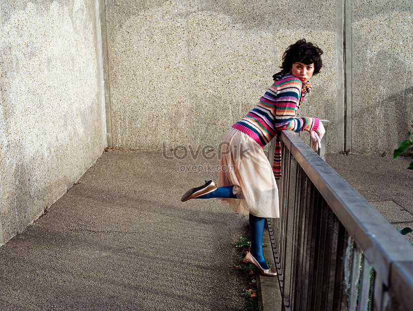 Woman Leaning On Railing Picture And Hd Photos Free Download On Lovepik