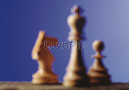 Chess Pieces On Some Blue Backgrounds With A Small White Pawn Wallpaper  Image For Free Download - Pngtree