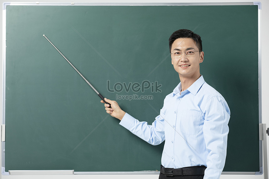 Male Teacher Giving A Lecture With A Teaching Stick Picture And HD ...