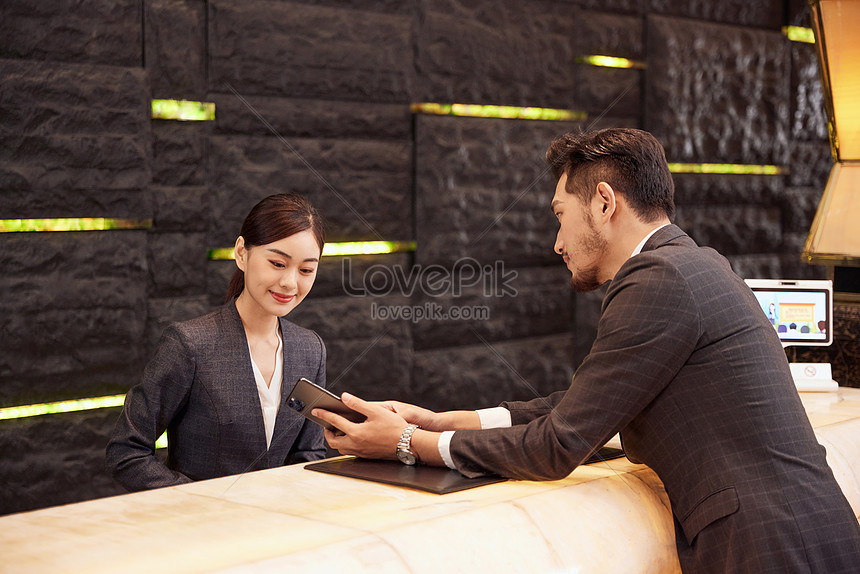 Hotel Front Desk Staff Check In For Customers Picture And Hd Photos 