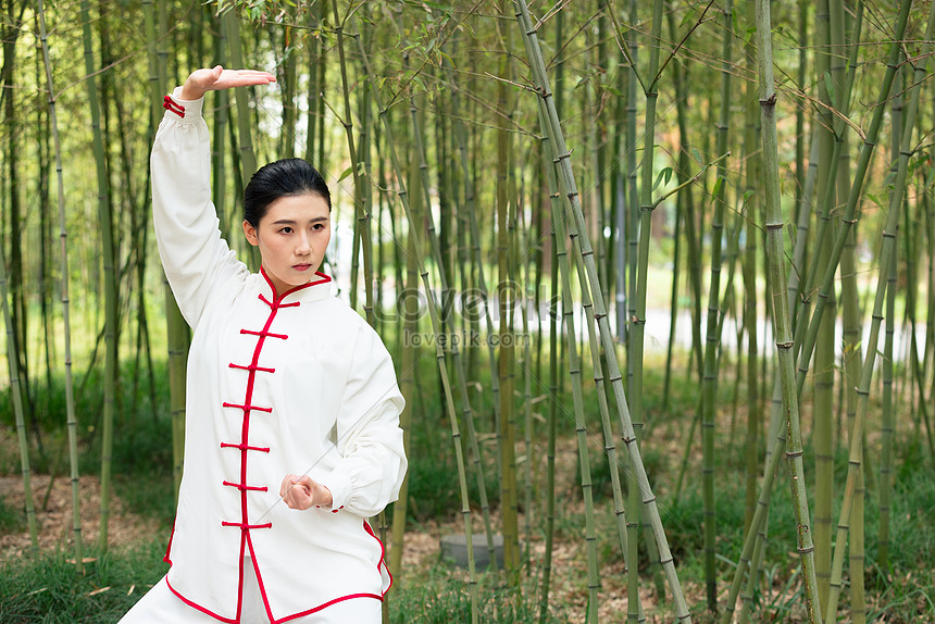 Women Practicing Tai Chi In The Park Flashing Their Arms Picture And HD ...