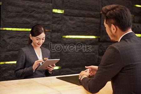 Hotel Front Desk Staff Check In For Customers Picture And Hd Photos 