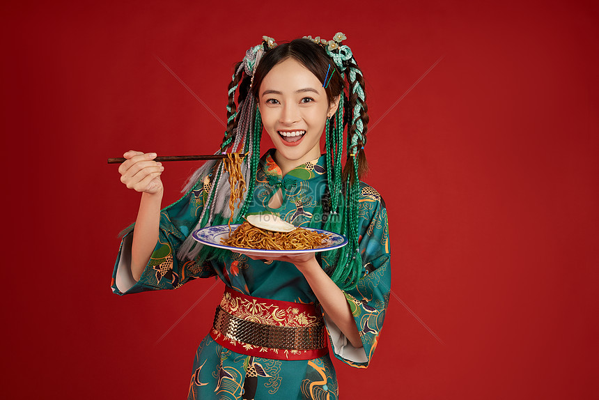 A Young Woman Eating Fried Noodles Picture And HD Photos | Free ...