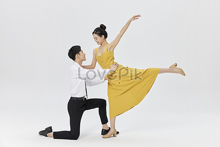 Ballrom dance couple in a dance pose isolated on white bachground Stock  Photo by ©stetsik 150443268