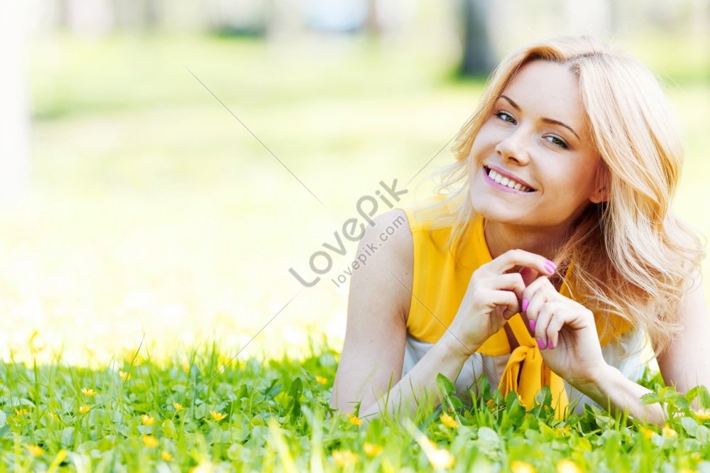 Blonde Woman Lying On The Grass With A Smile Picture And HD Photos ...