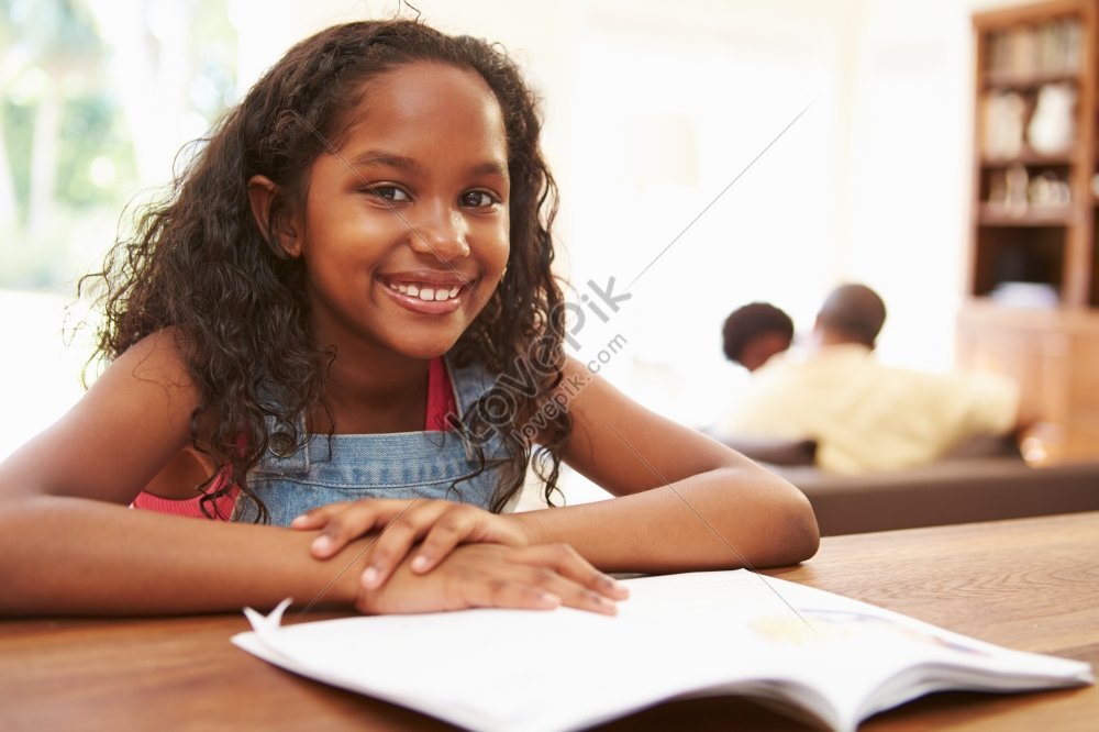 girl reading book at table for homework, look, horizontal, and homework HD Photo