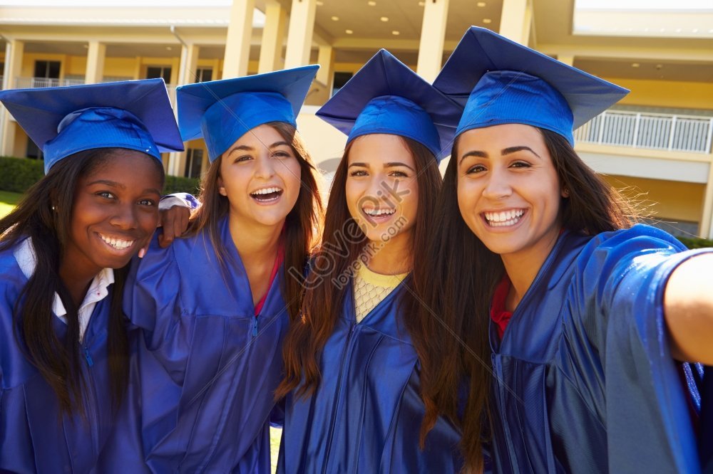 Group Of Female High School Students Celebrating Graduation Ceremony ...