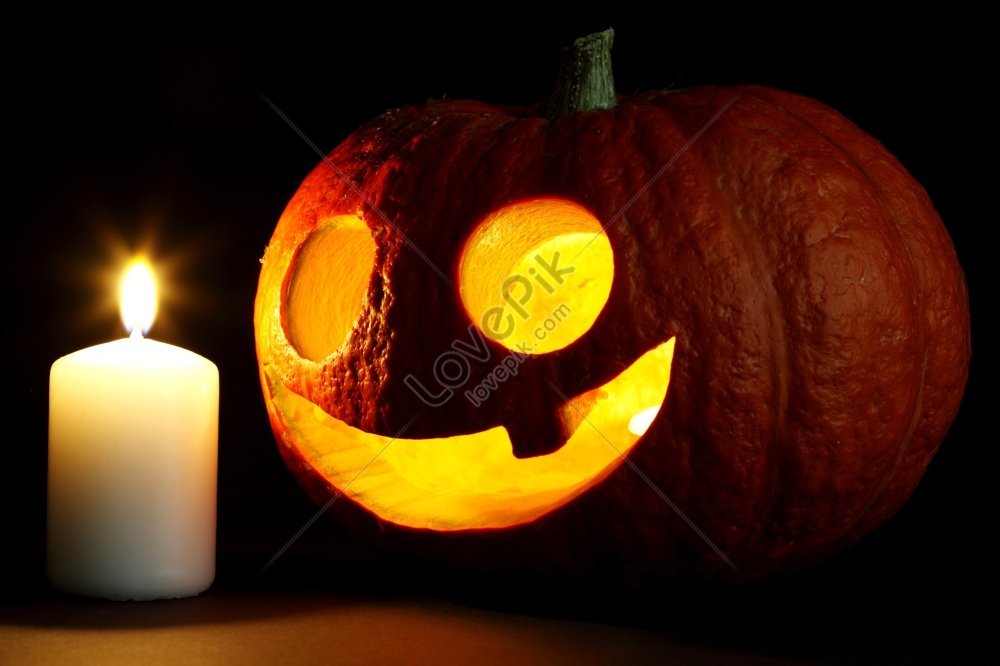 Halloween Carved Pumpkin And Candle On Black Background Picture And HD ...