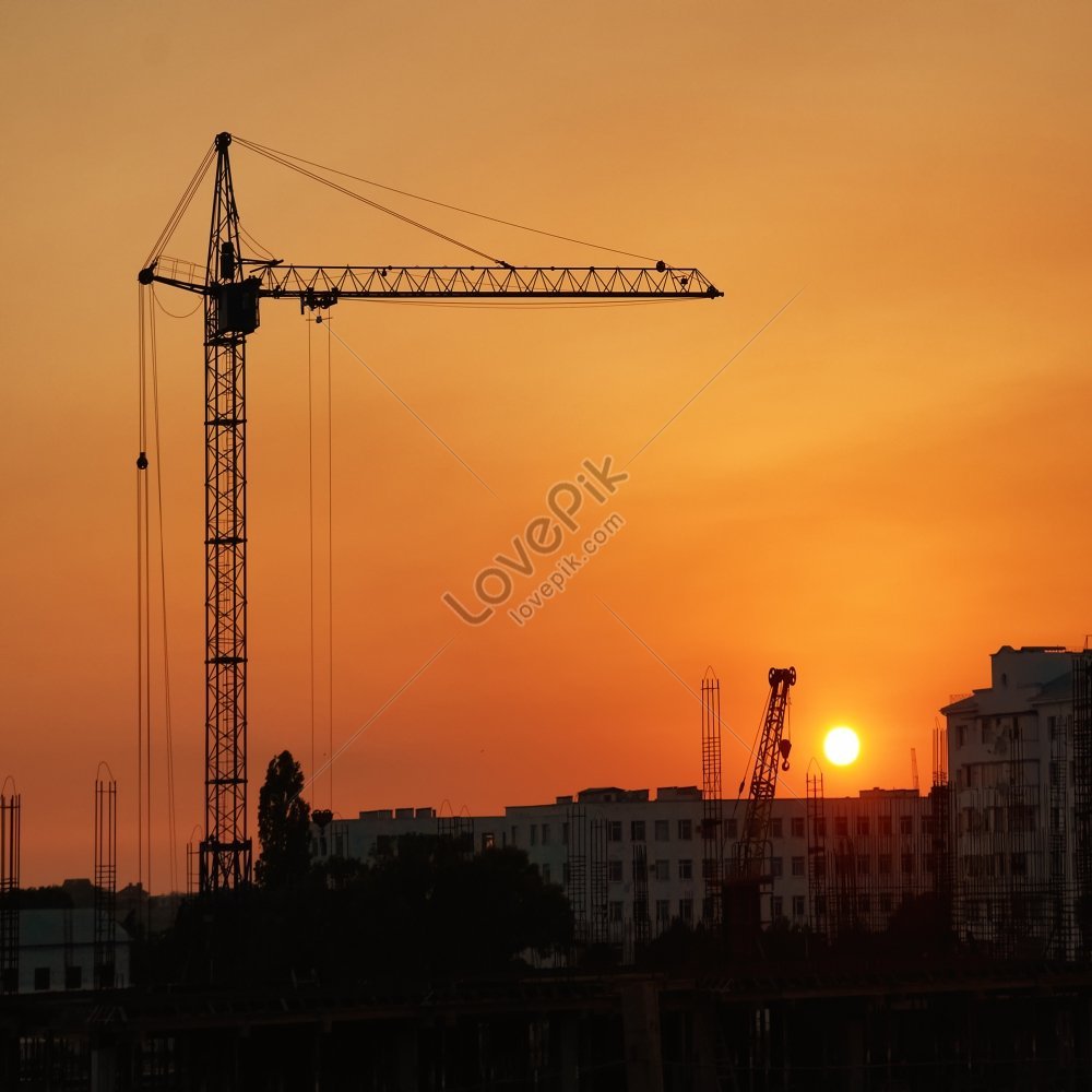 Industrial Cranes Against Red Sun Over Orange Sunset Picture And HD ...