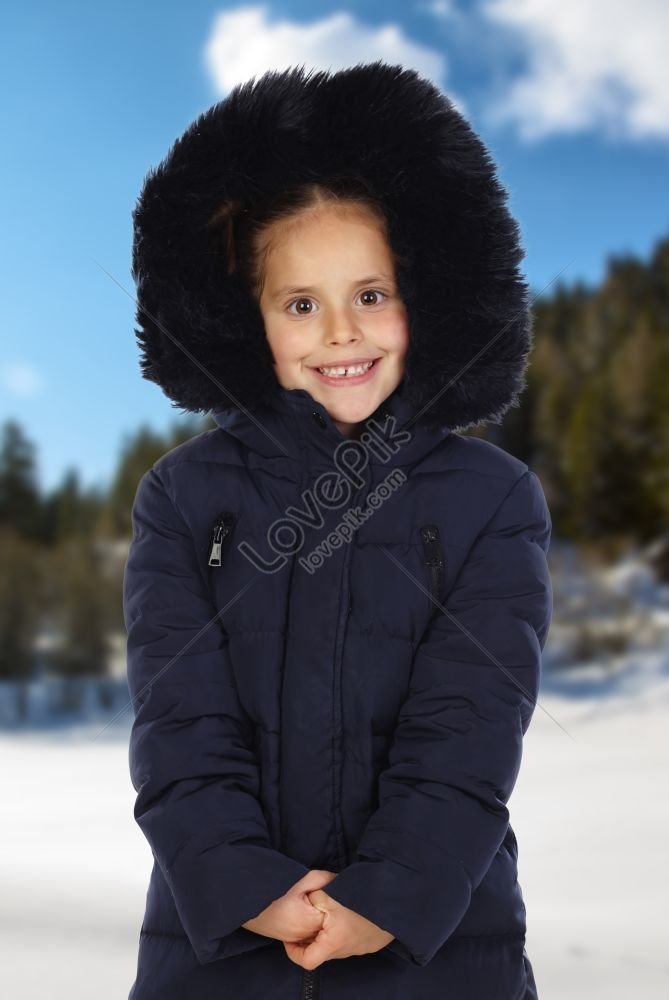 Sheltered Girl In Black Coat And Hood On A Cold Snowy Day Picture And ...