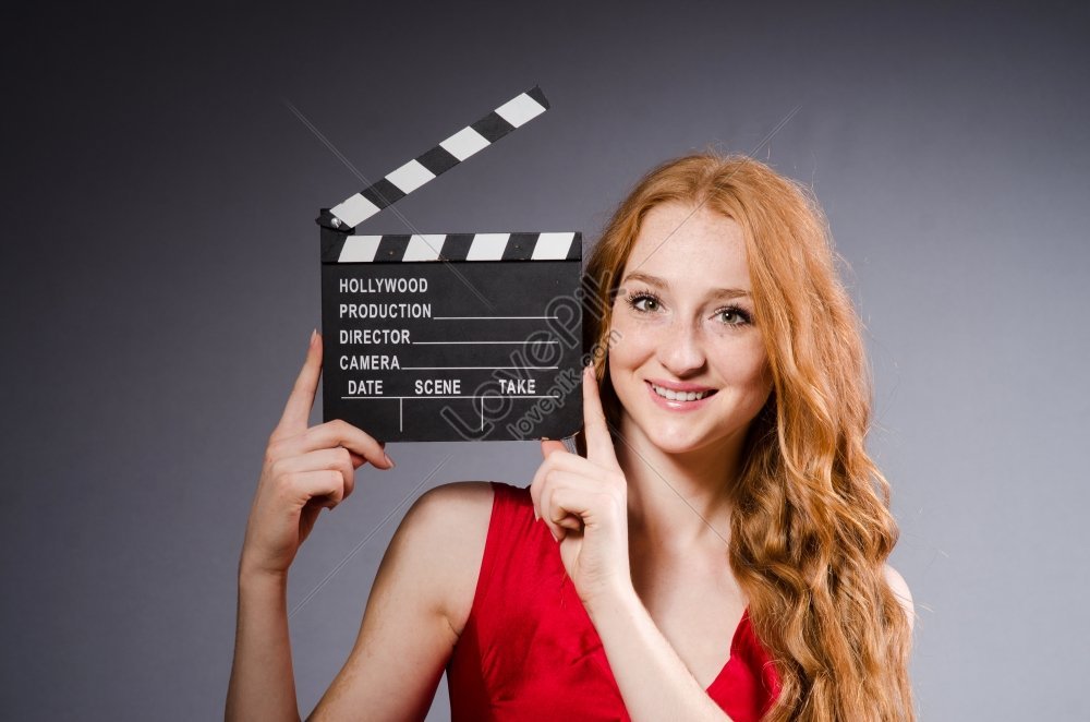 Woman In Red Dress Holding Movie Poster Picture And HD Photos | Free ...