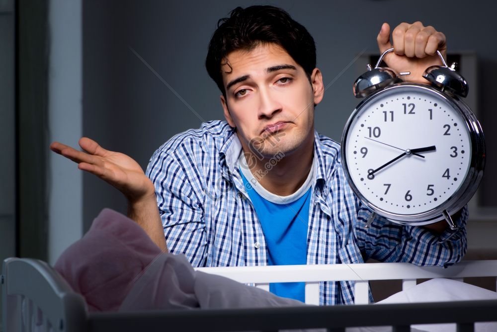 Young Father Taking A Nap While Caring For Newborn Baby Photo Picture