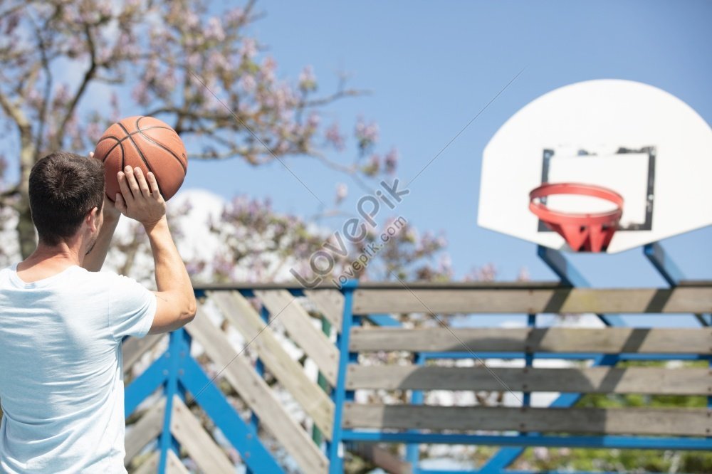 African American Basketball Player Displaying His Abilities In A Photo ...