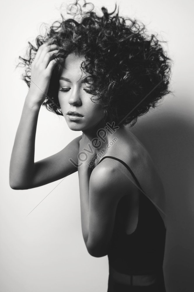 Black And White Fashion Studio Portrait Of A Beautiful Woman In A Black ...