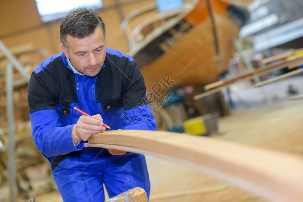 boatmaker-plotting-position-on-curved-timber-piece-photo-picture-and-hd