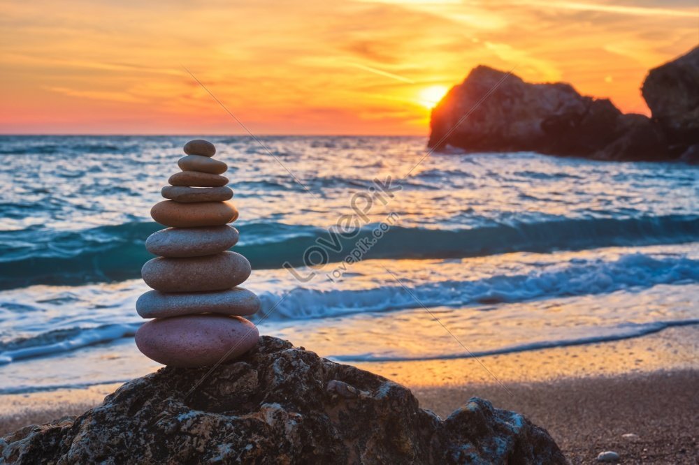 Agios Ioannis Beach Photo Of A Sunset Cairn Stack Of Stones And Pebbles ...