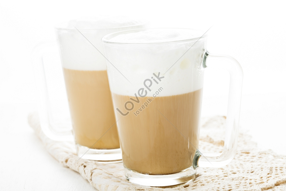 latte macchiato and cappuccino with glass cup and mug on a mirrored black  background, space for text Photos