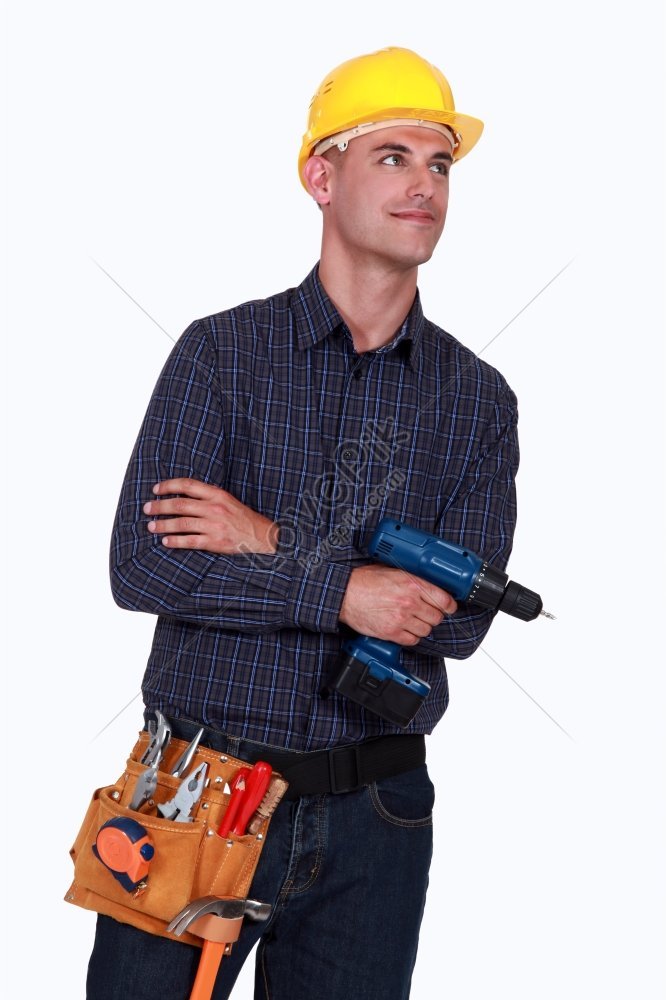 Photo Of A Craftsman Holding A Drill Picture And HD Photos | Free ...