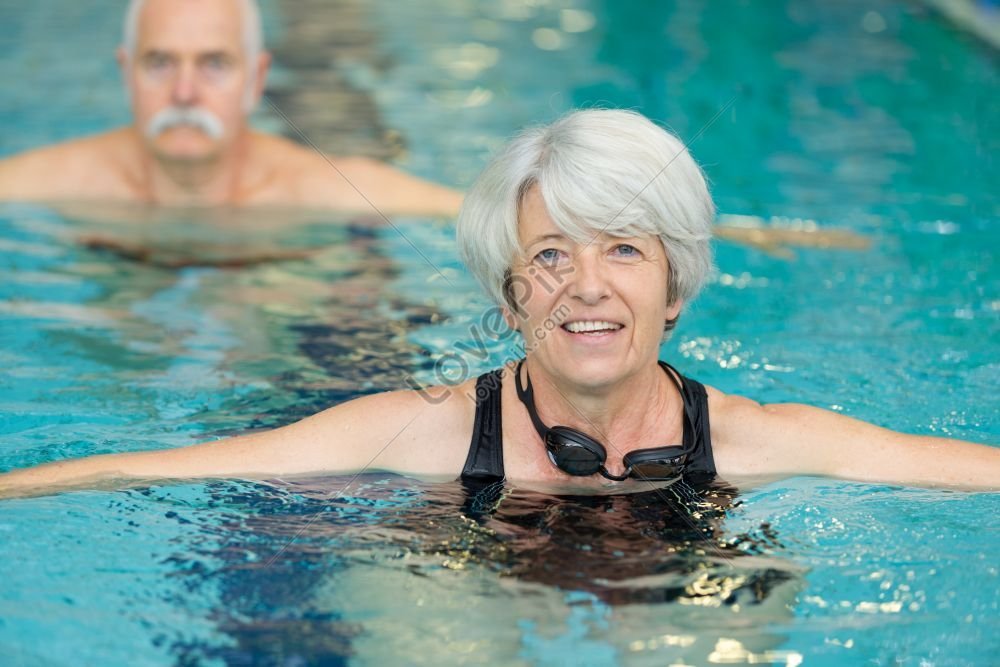 Senior Woman In Pool Exercising And Staying Healthy Picture And HD ...