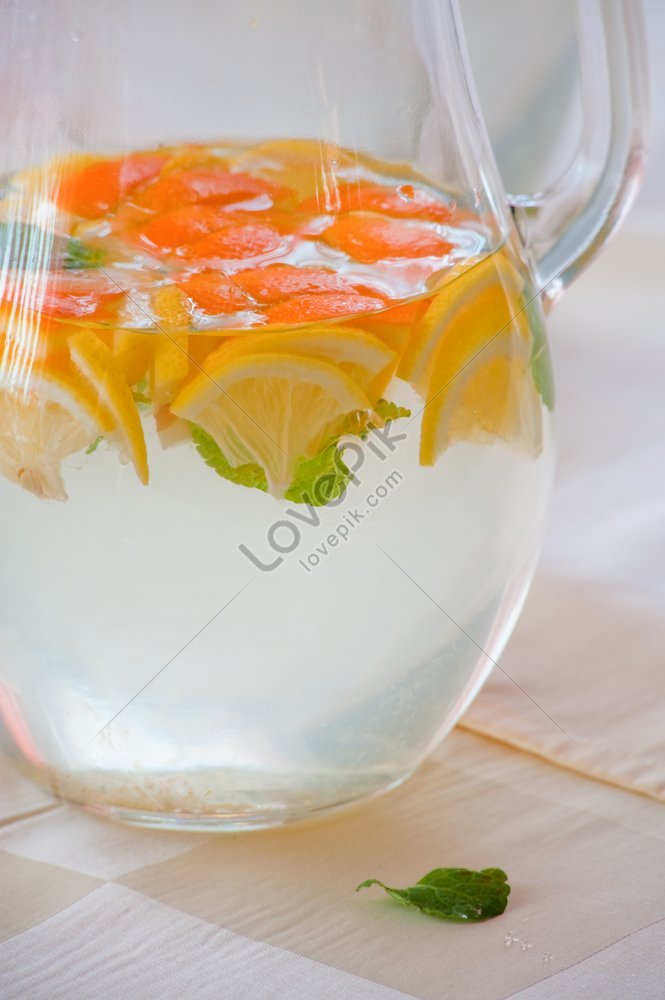 Photo Of A Jug Of Cold Water With Lemon And Orange Slices Picture And ...