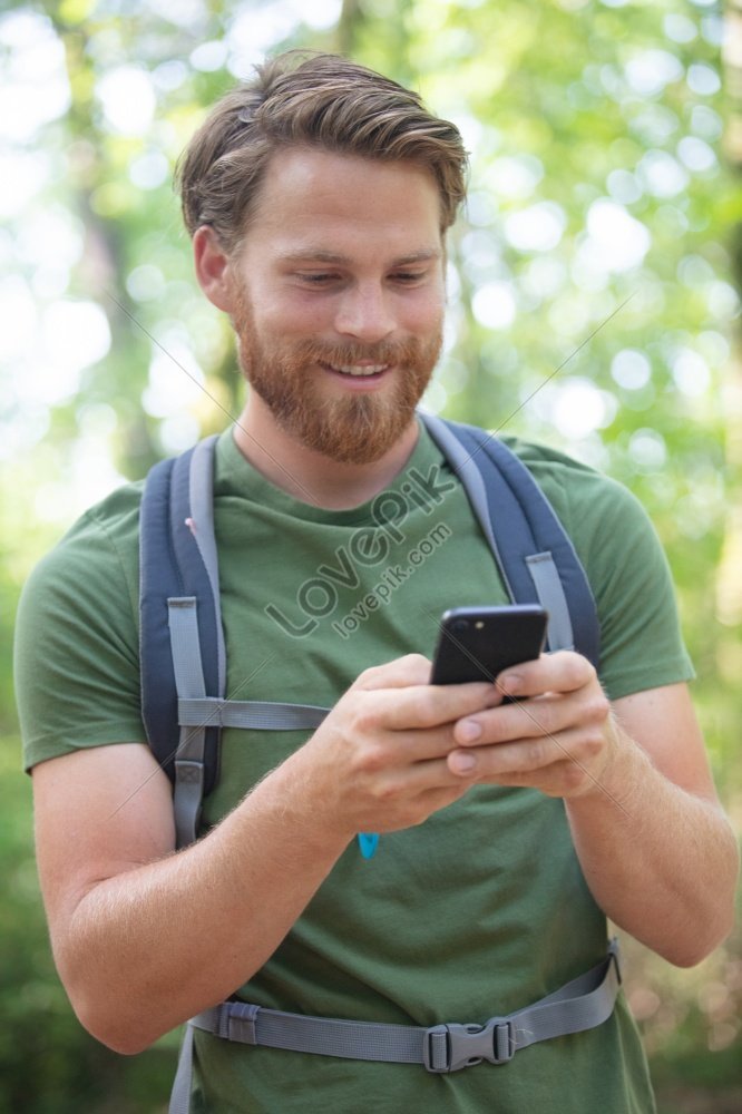 Man Using Mobile Phone While Summer Trekking Photo Picture And HD ...