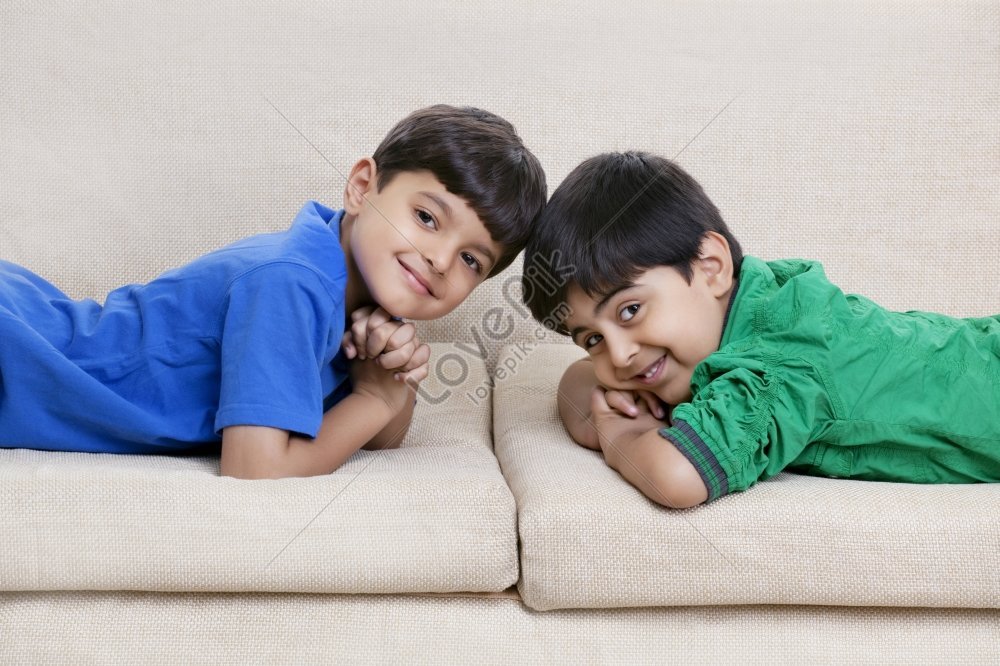 Portrait Of Adorable Boys Lying On A Sofa Picture And Hd Photos Free Download On Lovepik 7252