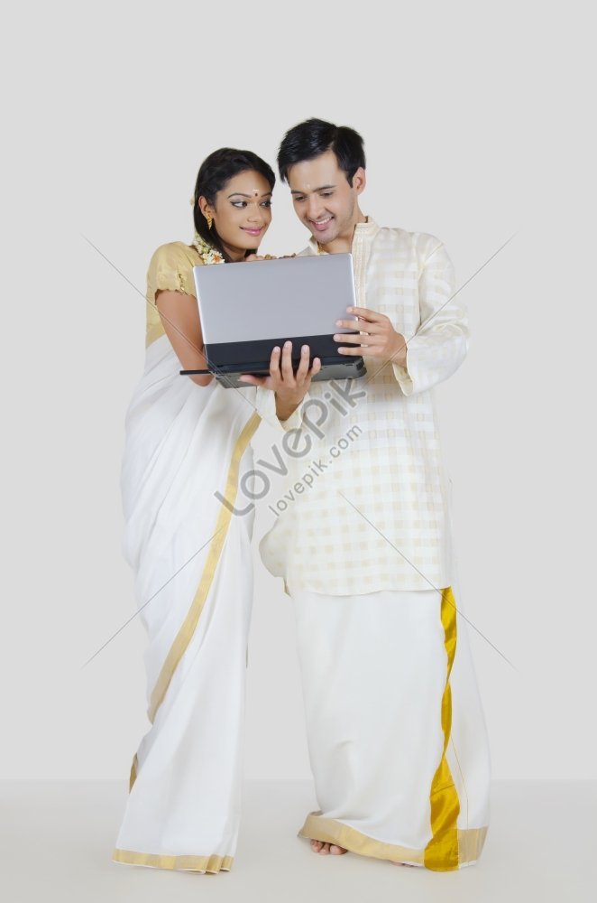 South Indian couple standing together and smiling Stock Photo - Alamy