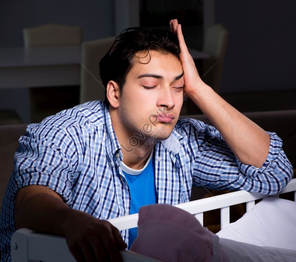 A Photo Of Young Father Sleeping While Caring For Newborn Baby Picture ...