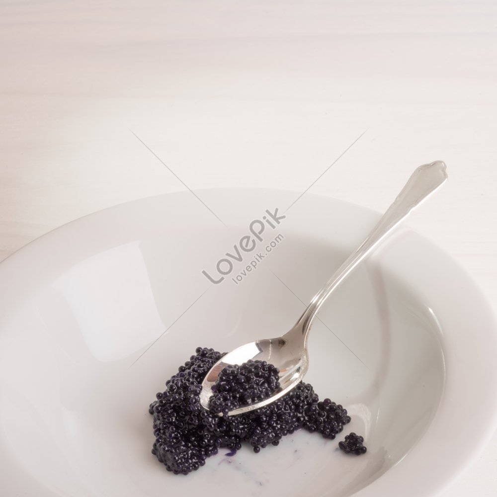 Un Cucchiaio D'argento Su Un Fondo Bianco Fotografia Stock