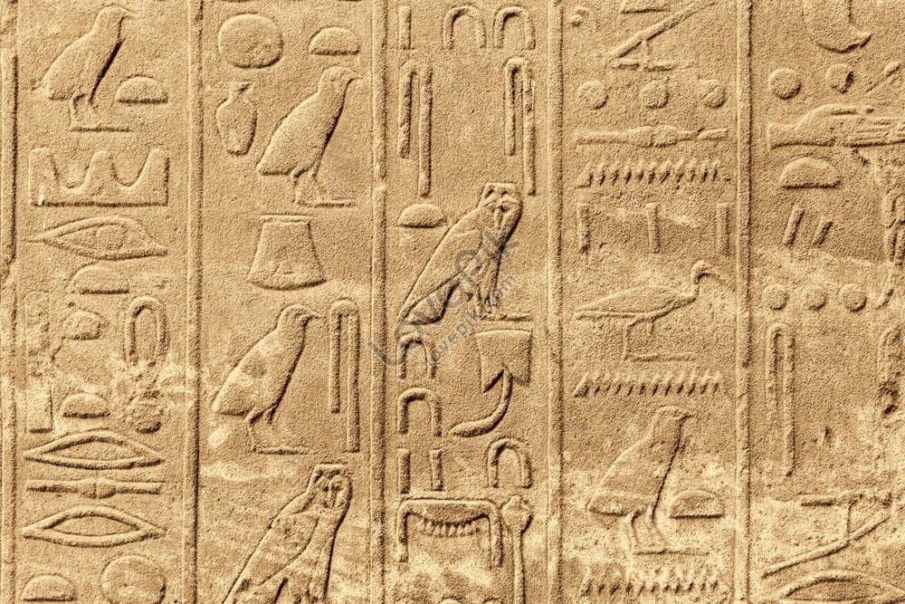 Photo Of Ancient Egyptian Hieroglyphs Carved On The Stone Wall Of ...