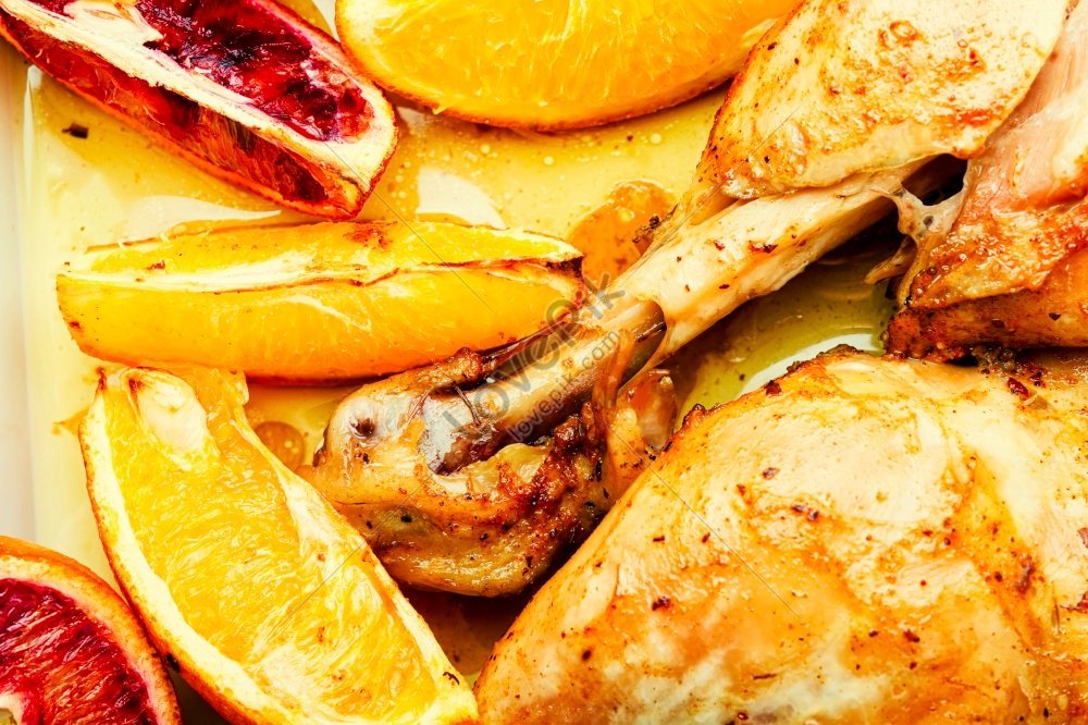 Delicious Grilled Chicken Legs With Citrus Fruits Baked In A Baking ...