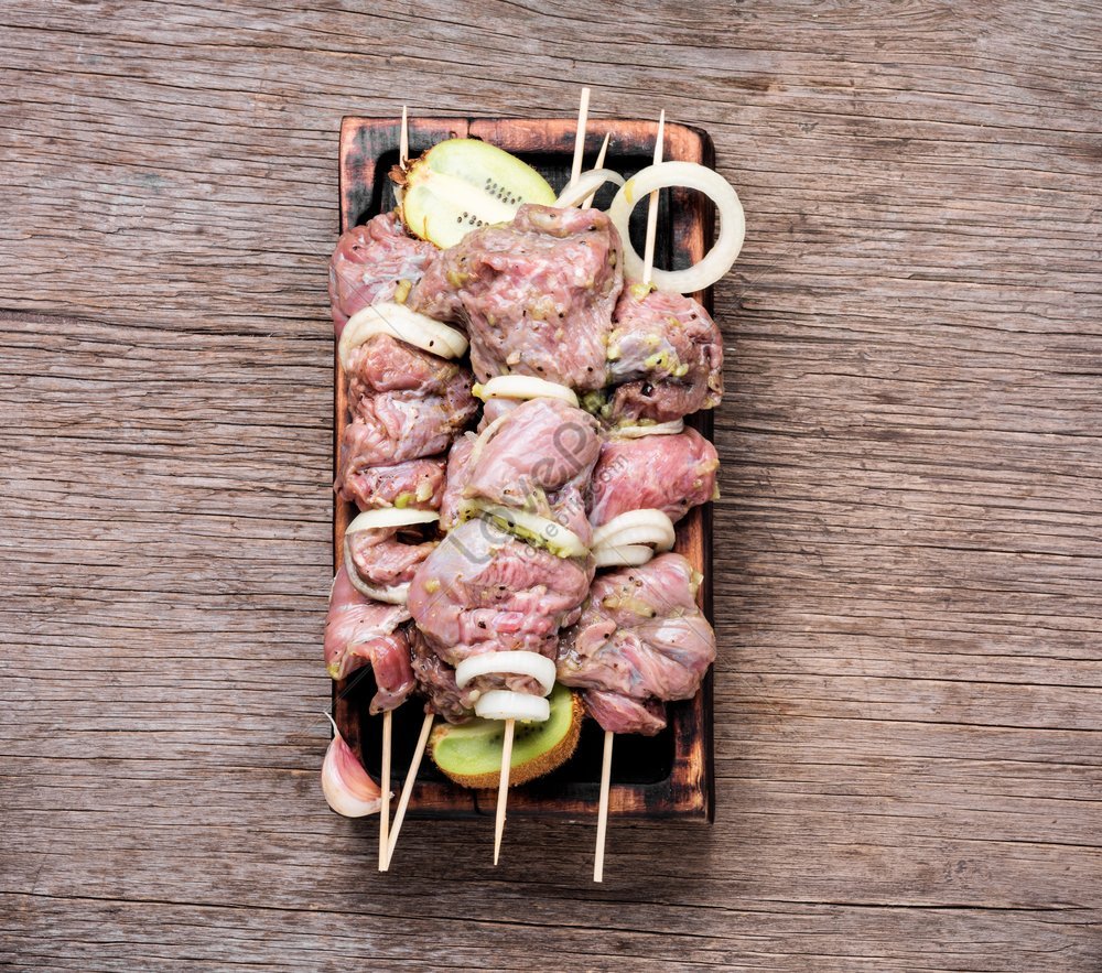 Premium AI Image  There are skewered meats on skewers on a cutting board  generative ai