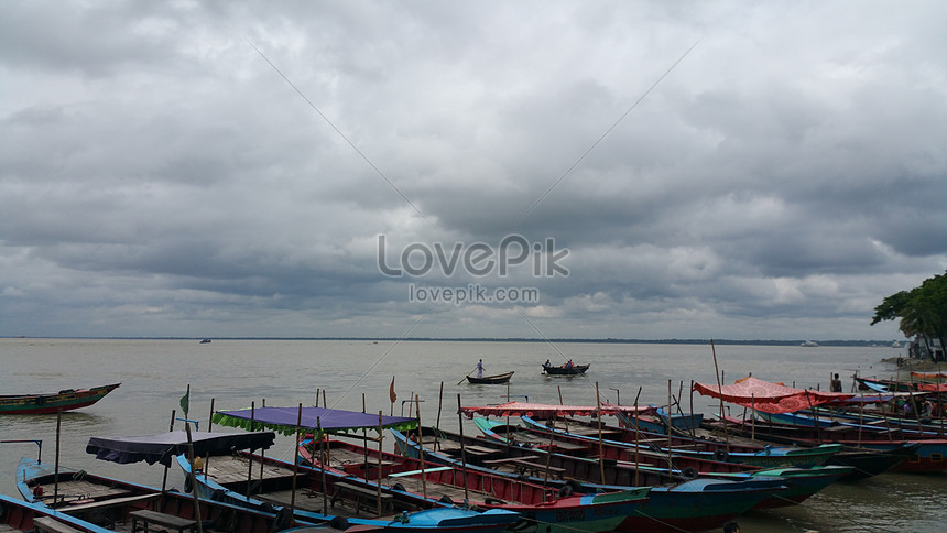 Colorful Voyage: A River Journey in Vibrant Boats, Colorful Boats,  River,  Wooden Boats HD Photo