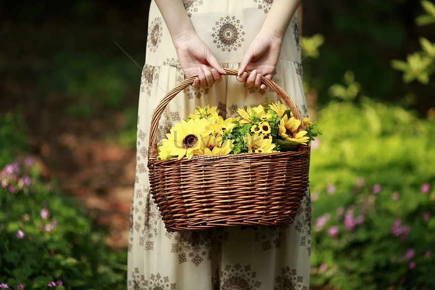 girl with a basket of flowers