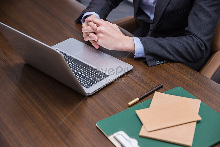 Close Up Of Office Mens Hands In Front Of Their Desks Photo