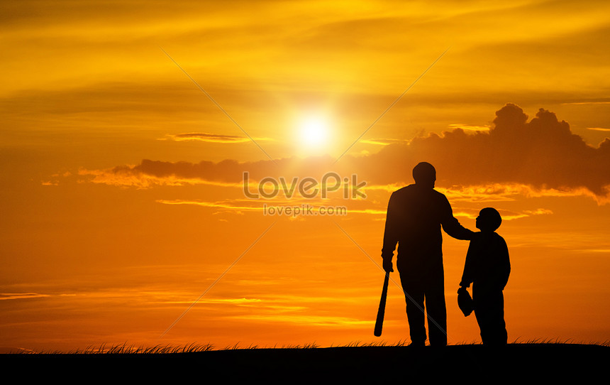 The shadow of the father and son under the sunset creative image ...